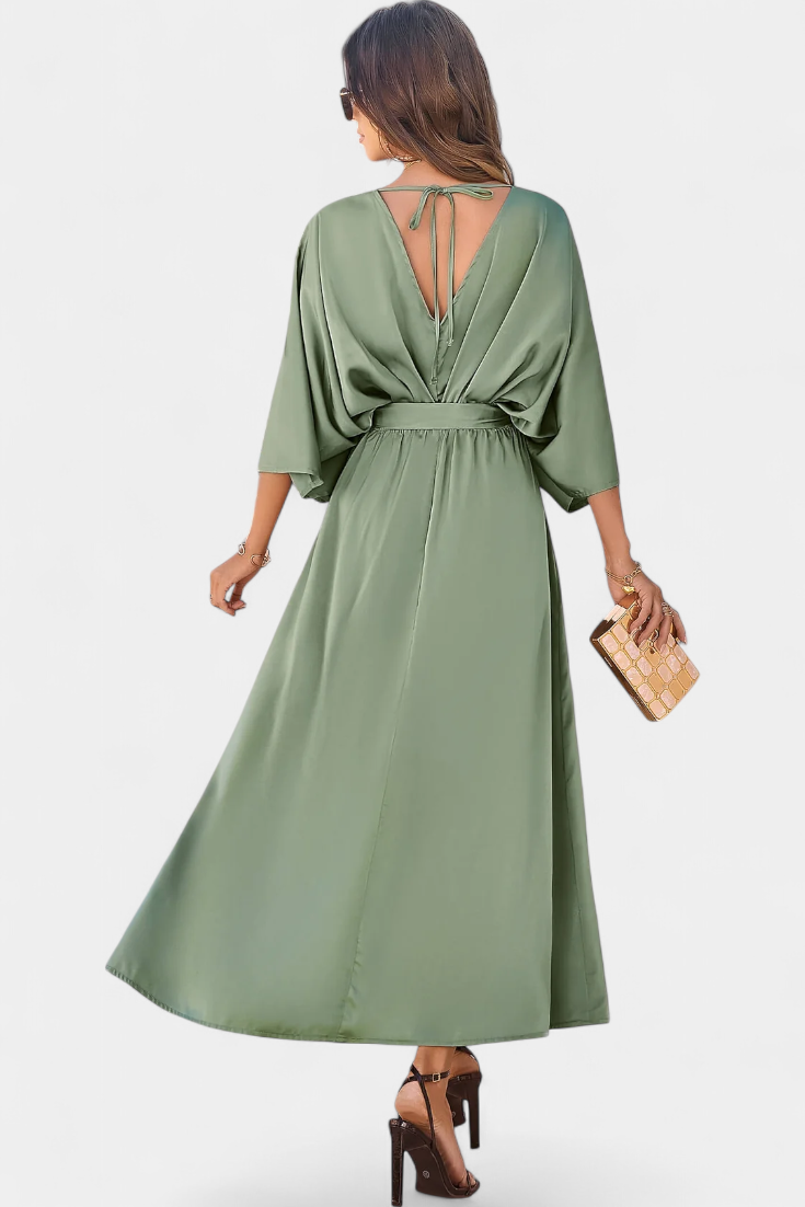 Milly Elegant φόρεμα με φιόγκο και άνοιγμα